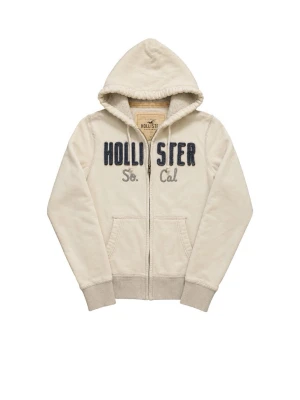 Vit Hollister hoodie med dragkedja - Vit hoodie från Hollister med dragkedja, broderad blå text 'HOLLISTER' och grå text 'So. Cal' på bröstet. Mjuk insida, två fickor fram och justerbar huva med snören. Klassisk college-stil och ribbade muddar vid ärmslut och nederkant. Skick 9/10 