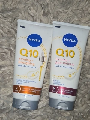 Lotion - Detta paket innehåller två Nivea Q10 hudvårdsprodukter. En Nivea Q10 Firming + Energizing Body Serum-Lotion och en Nivea Q10 Firming + Anti-Wrinkle Neck & Chest Cream. Båda produkterna är i 200 ml. Serum-lotion är taget ur. Men det borde va mer än halva kvar. Neck & chest cream inte taget ur.