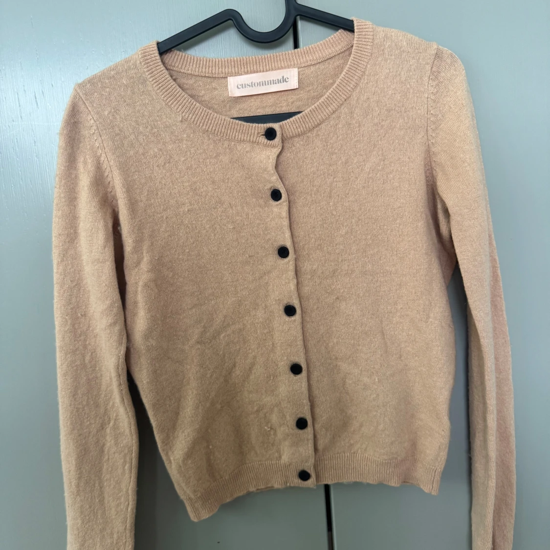 Beige kofta från Custommade