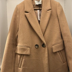 Kappa  - Ny kappa aldrig andvänd med etiketter. Ny pris 899kr 