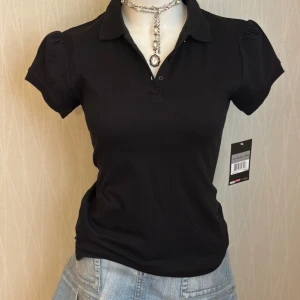 Coquette T-shirt  - Tag says L but it fits more like XS