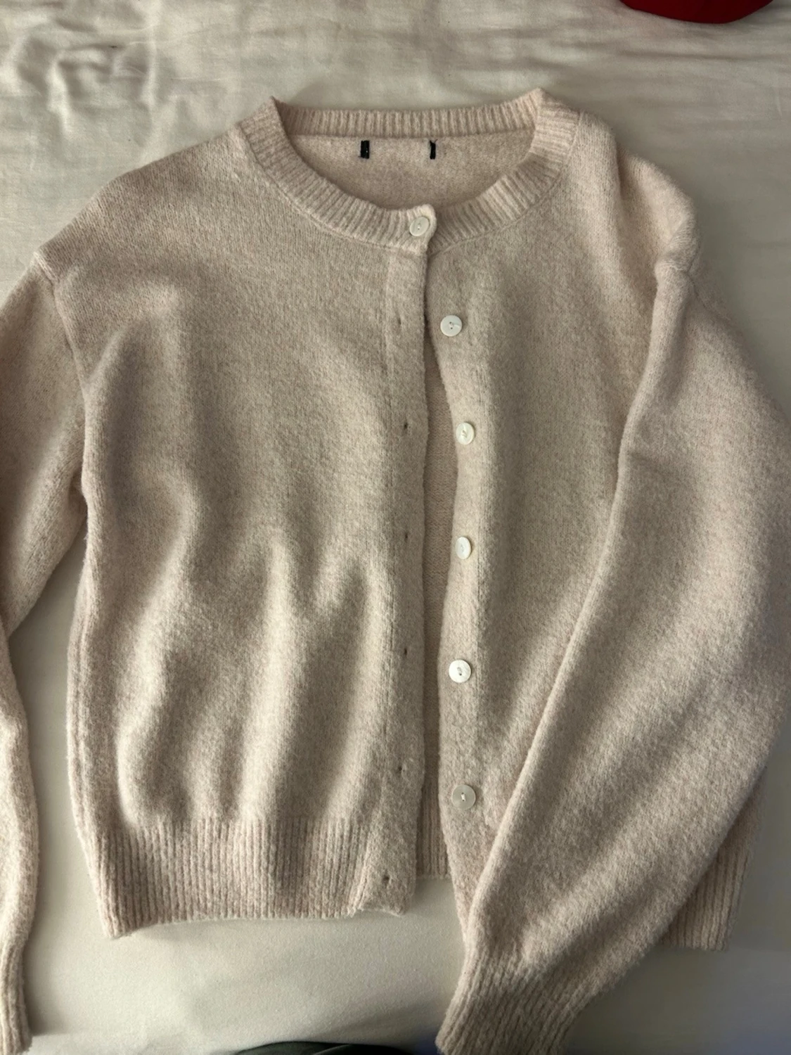 Ljusrosa stickad kofta 