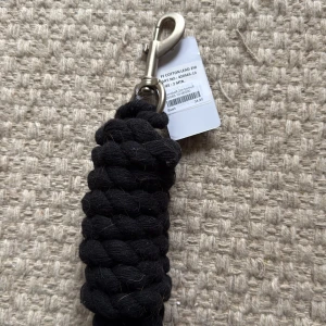 Svart grimma - Aldrig använd. 