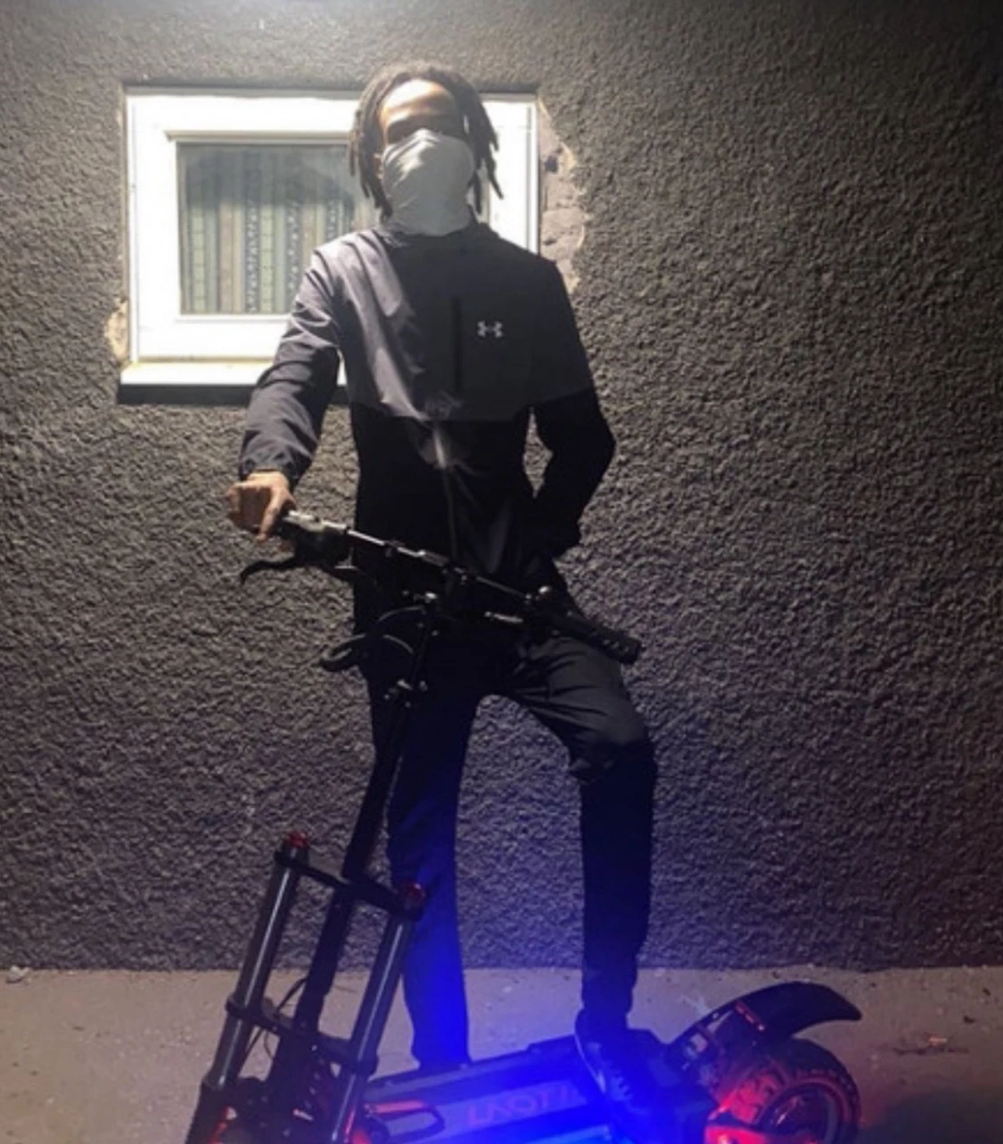 Grå och svart vindjacka Under Armour