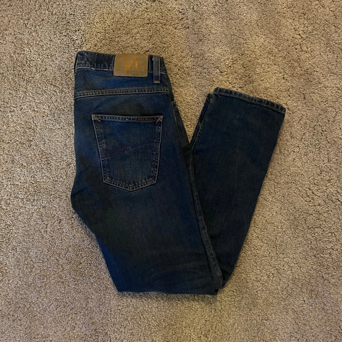 Mörkblå Nudie Jeans  W30 L30 Grim Tim