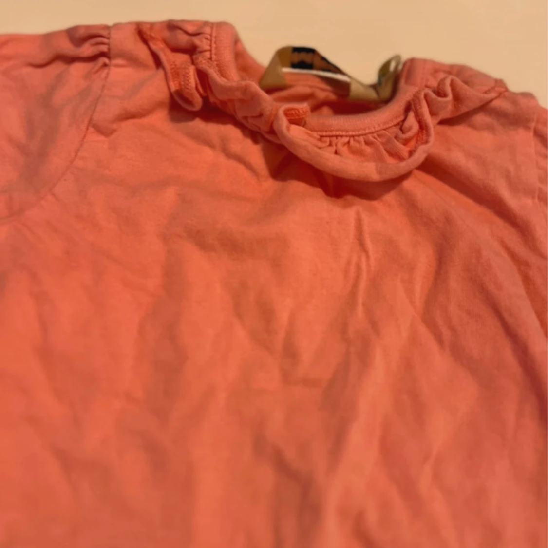 Rosa body med volang  - 3