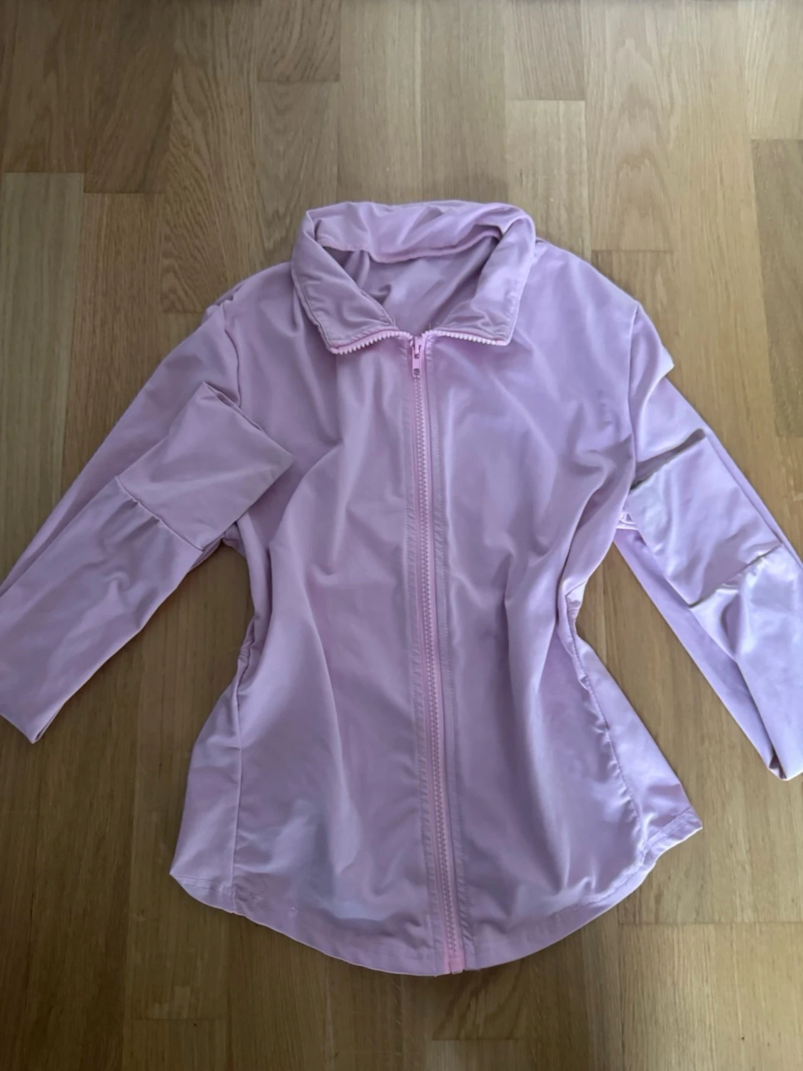 Ljusrosa vindjacka med dragkedja - 1