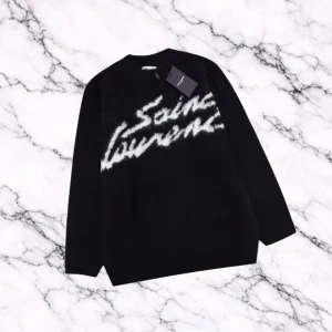 Svart Saint Laurent Sweater - En svart Saint Laurent tröja som har nice tryck, ull som majoriteten av materialet och bra passform.