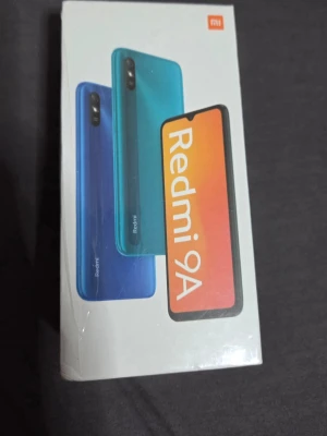 Xiaomi Redmi 9A Granite Gray 32GB - Xiaomi Redmi 9A i färgen Granite Gray med 2GB RAM och 32GB lagring. Snygg och stilren Android-telefon med stor skärm och enkel design. Perfekt för sociala medier, surf och appar. Levereras i originalförpackning med tillbehör.