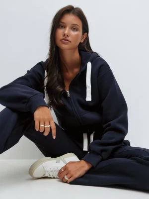 Mörkblå Zip hoodie  - Säljer min zip hoodie från Gina 14+ i storlek S då jag har flera stycken och just den här inte kommer till användning. Använd fåtal gånger och har inga defekter💕