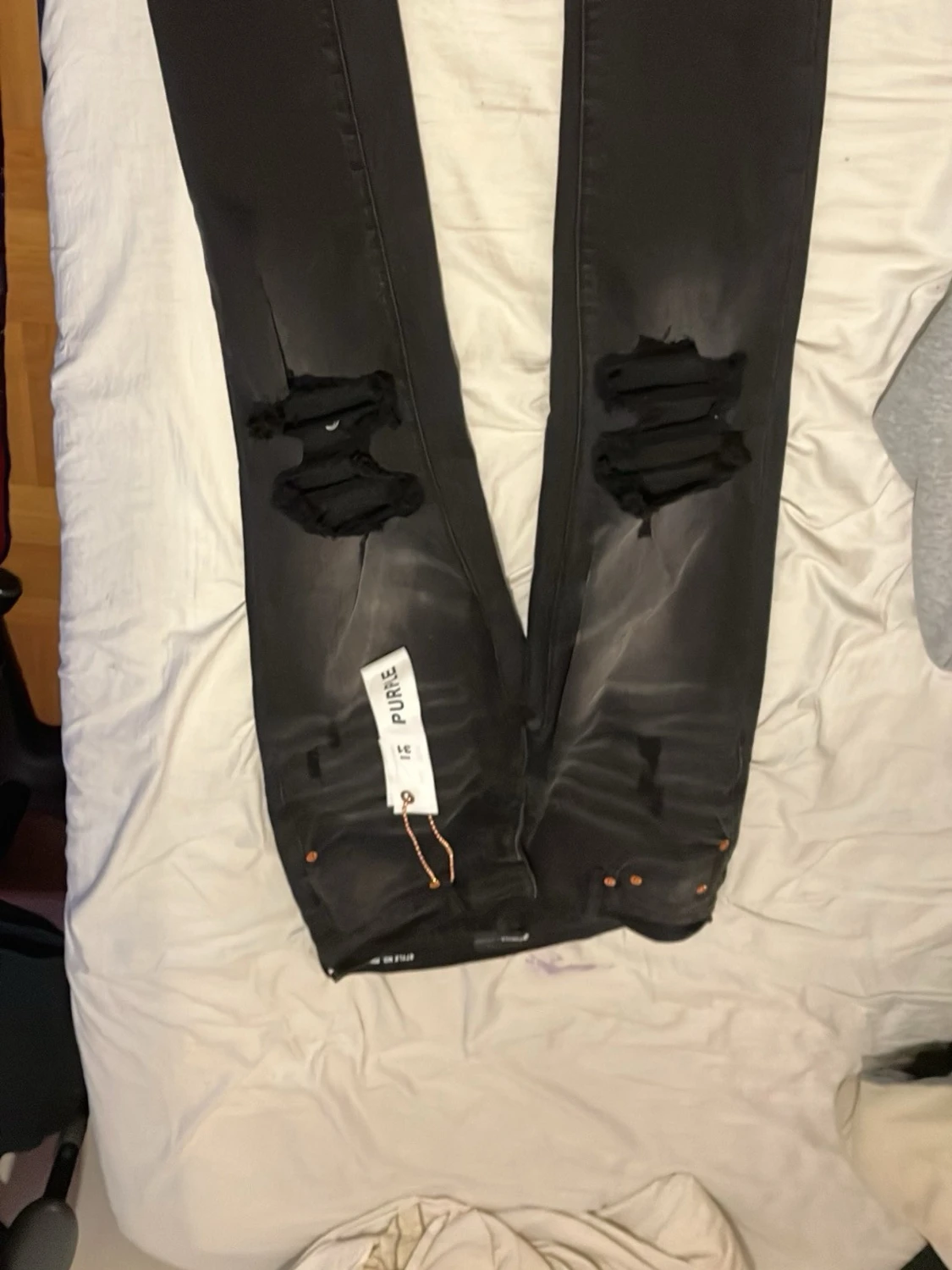 Svarta ripped jeans från Purple Brand