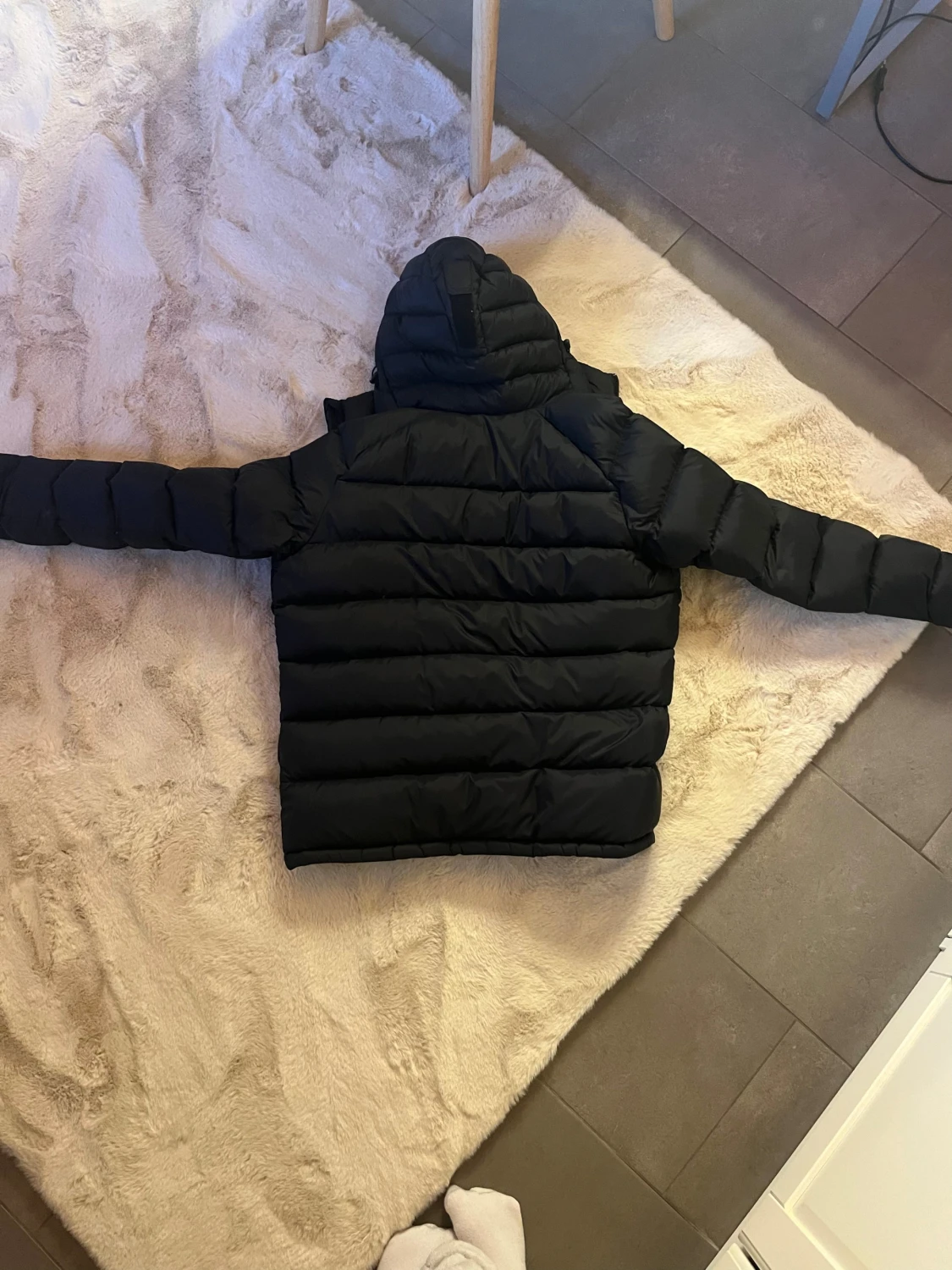 Svart pufferjacka Peak Performance L - 1