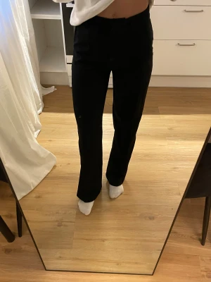 Svarta kostymbyxor från Madlady XS - Högmidja, något utsvängda och sömm framtill. 