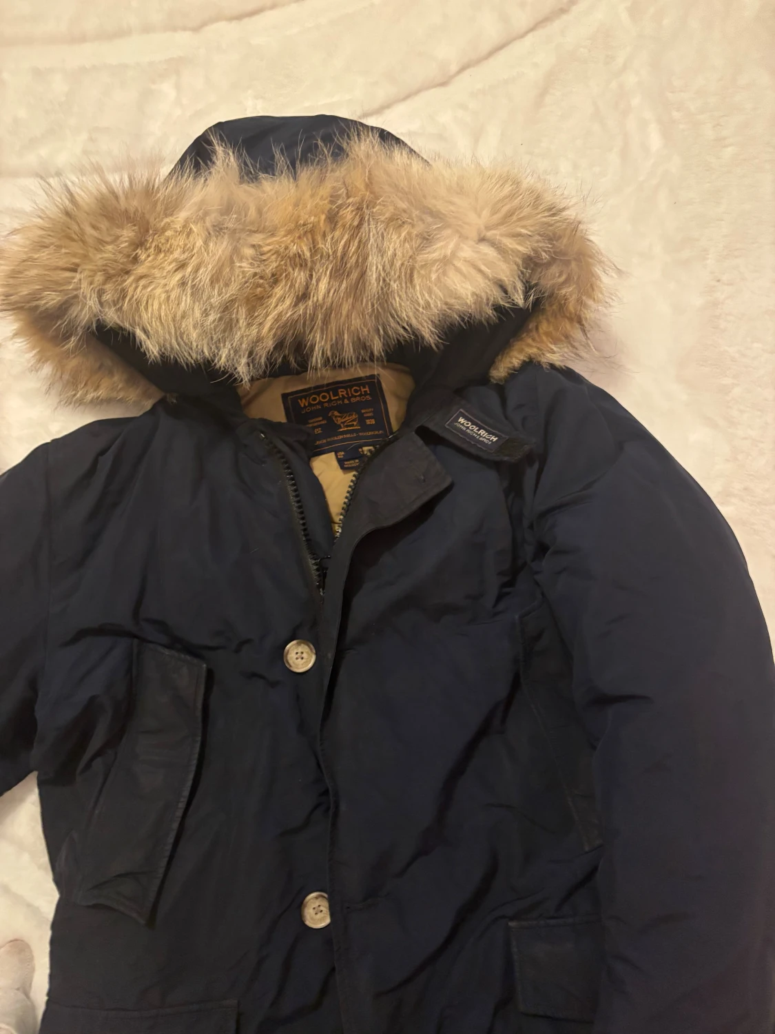 Mörkblå Woolrich parkas med päls
