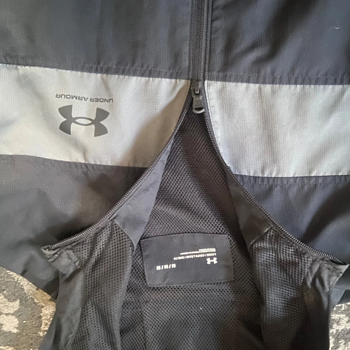 Svart vindjacka från Under Armour - 1