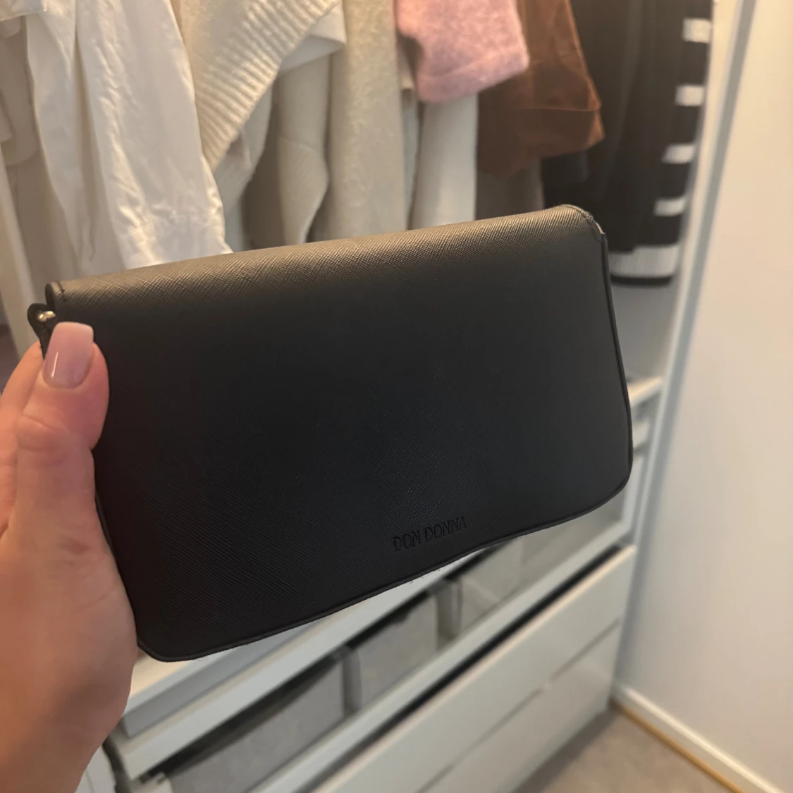 Svart kuvertväska från Don Donna - 1