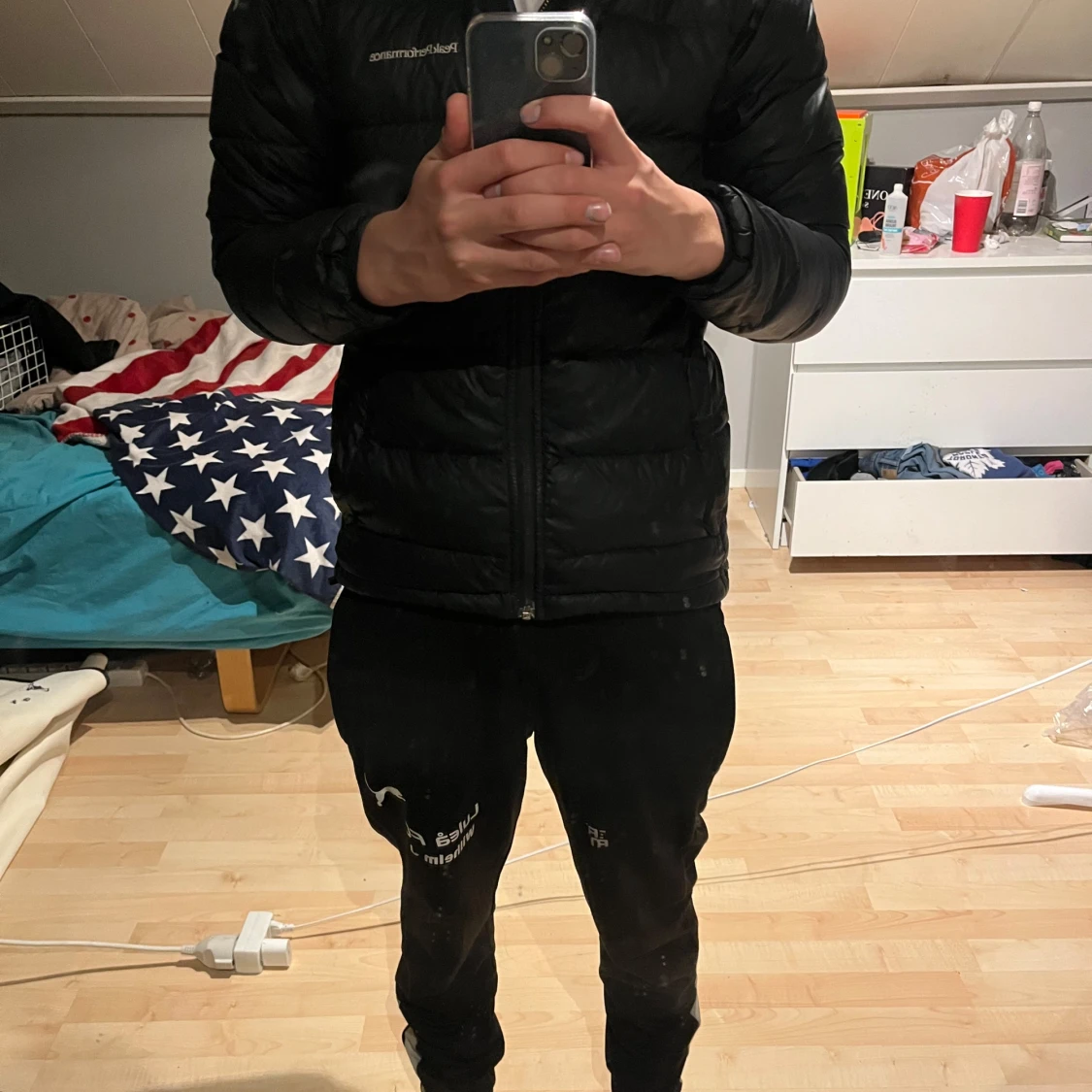 Svart dunjacka Peak Performance