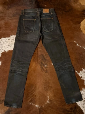 Nudie BigBengt - Tjena! Säljer dessa riktigt fina nudie BigBengt jeans, byxorna är i i väldigt fint skick och i storlek W30/L34, denna modell tillvinner längre så kan vara svår att få tag på, hör av dig vid funderingar!🙌