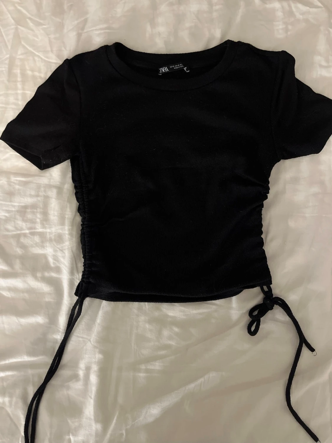 Svart topp med scrunch från Zara