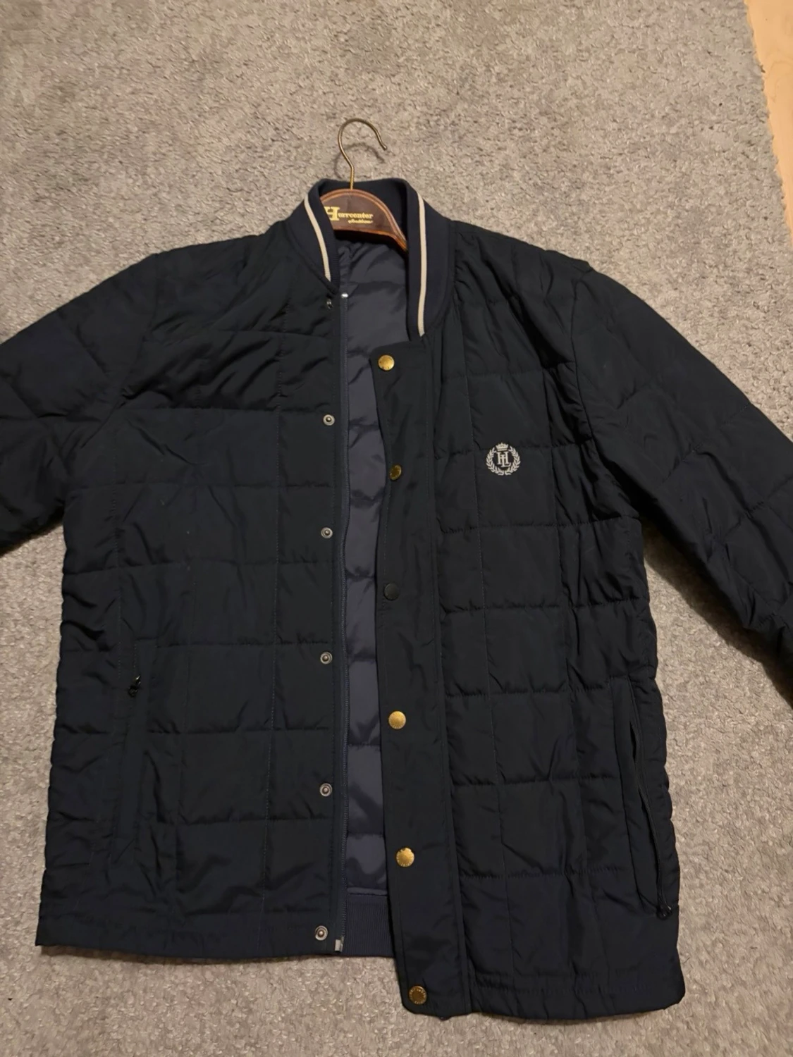 Mörkblå quiltad bomberjacka Henri Lloyd