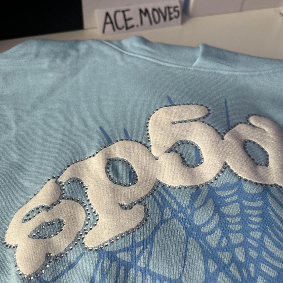 Ljusblå Sp5der hoodie med strass - 1