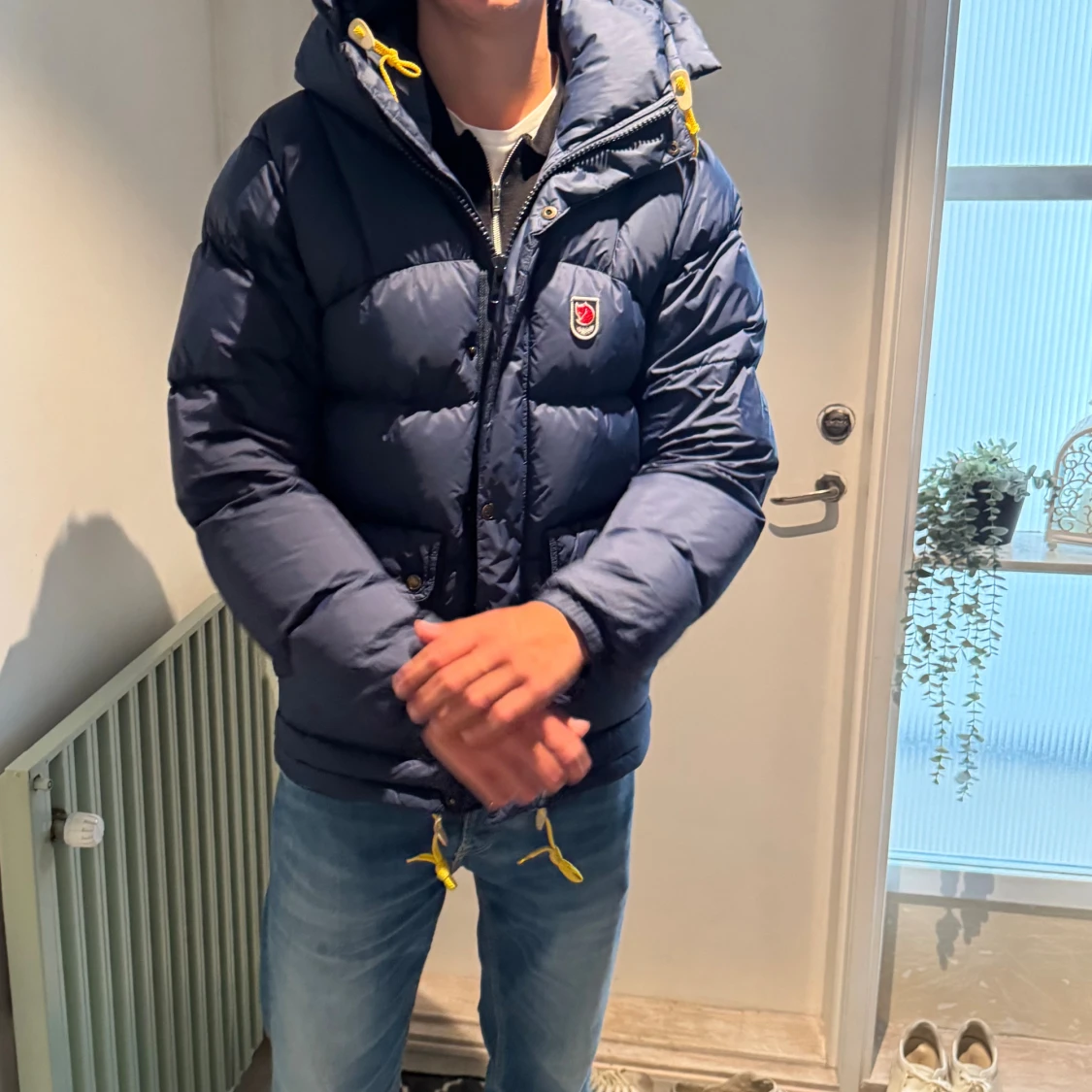 Mörkblå dunjacka från Fjällräven