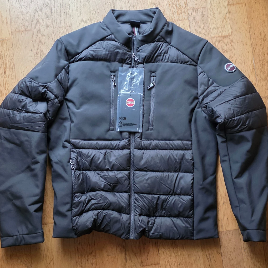 Mörkgrå dunjacka från Colmar Storlek 52 Ny oanvänd 