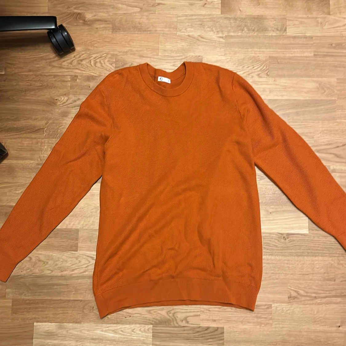 Orange stickad tröja från C, XL