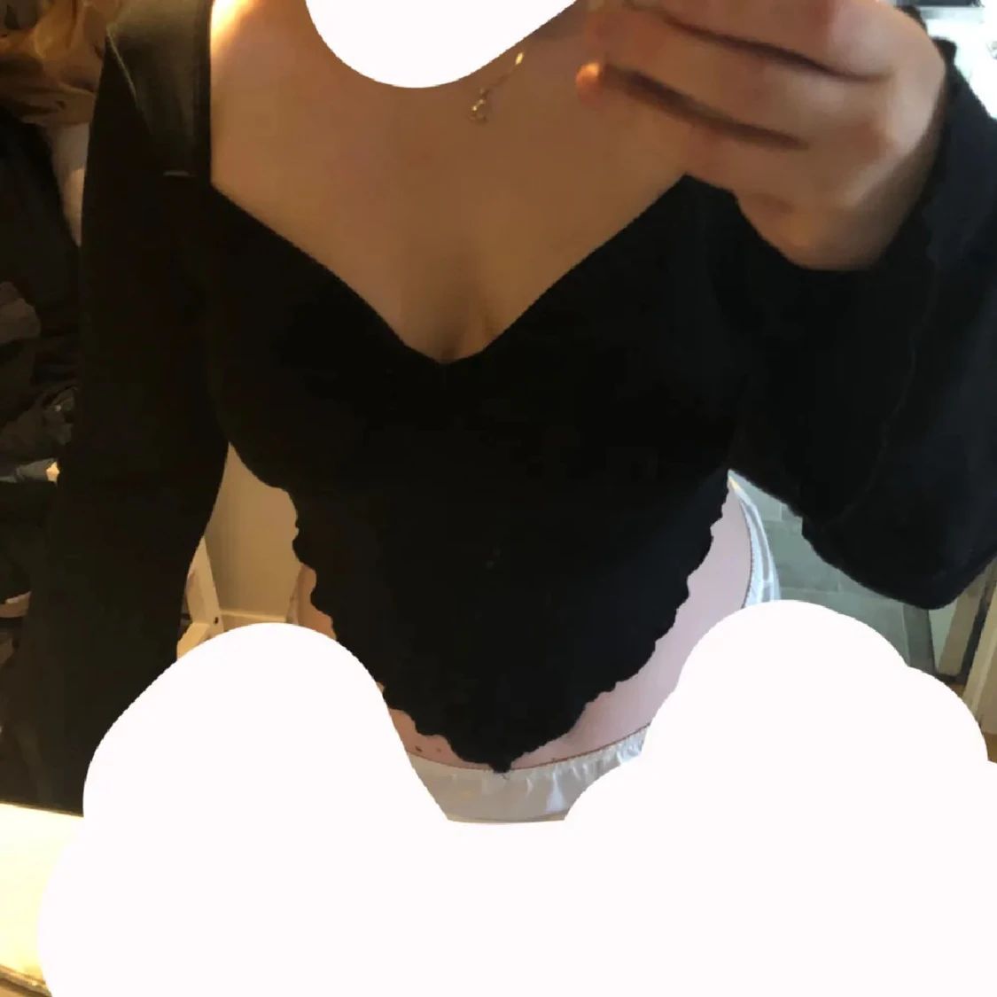 Svart croppad långärmad topp