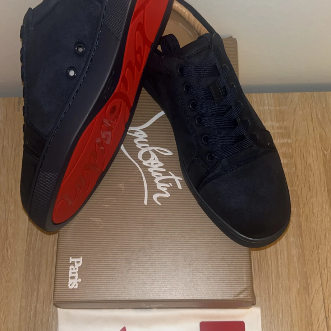 Svarta sneakers från Christian Louboutin - 1