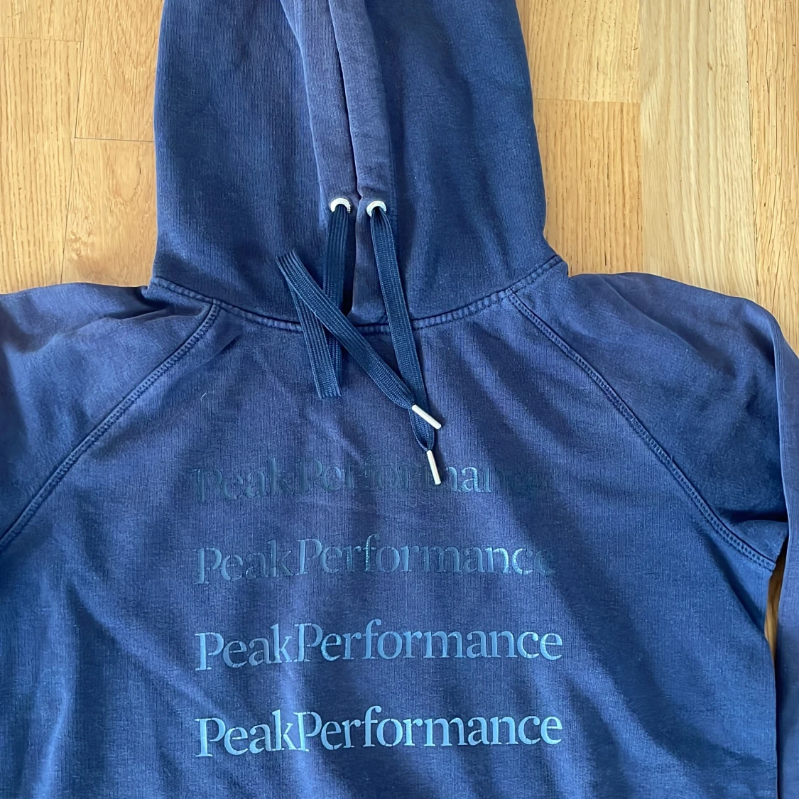 Blå hoodie från Peak Performance XS - 1
