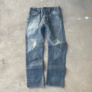 Clear waxed jeans  - Waist 41,5cm, length 109cm, leg opening 22cm.