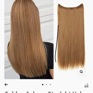 Golden Auburn Straight Halo Hair Extensions 46 cm - Golden Auburn Straight Halo Hair Extensions. Längd: 46 cm / 18" (130g). Se bilder för applicering och skötselråd. Håret kan plattas.Säljer då färgen passade inte mig.Bra kvalité.