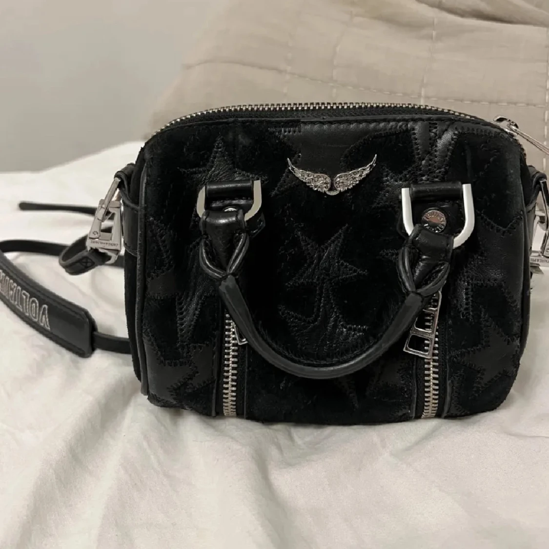 Svart handväska från Voltaire