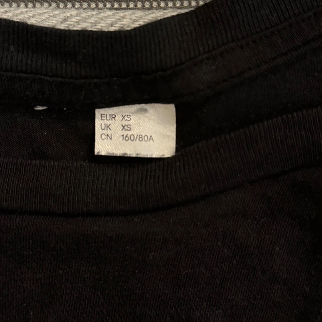 Svart kortärmad topp XS - 1