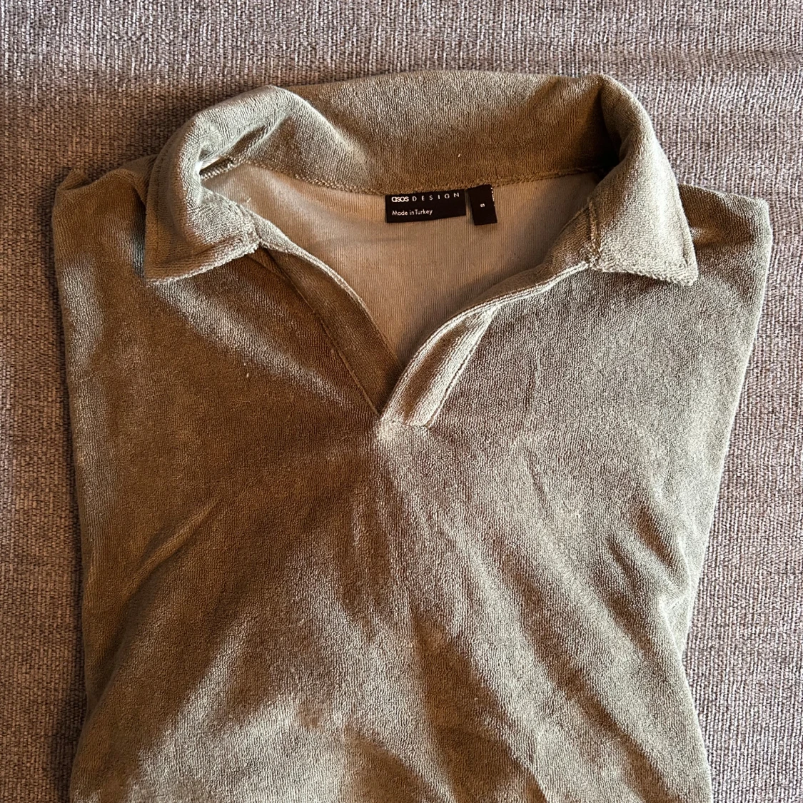 Grön (khaki) frottépiké från ASOS.