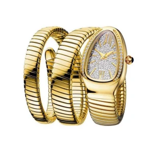 Lyxig ormformad klocka i guld och silver - Säljer en riktigt snygg ormformad klocka med spiralarmband. Finns i helguld, helsilver eller guld/silver. Urtavlan är droppformad och glittrar med stenar och romerska siffror. Klockan har en cool och unik design som verkligen sticker ut.