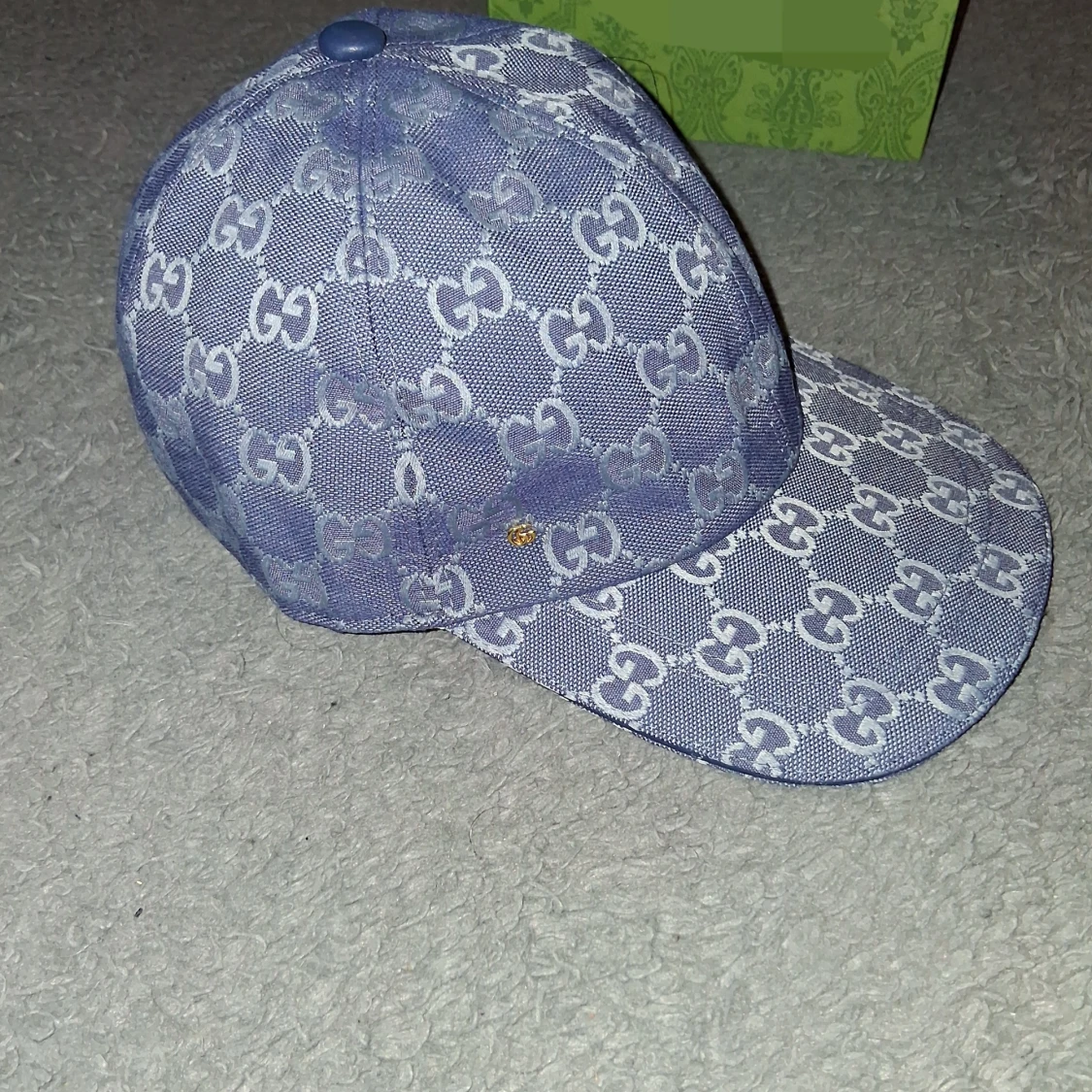 Blå kepsi med GG-mönster