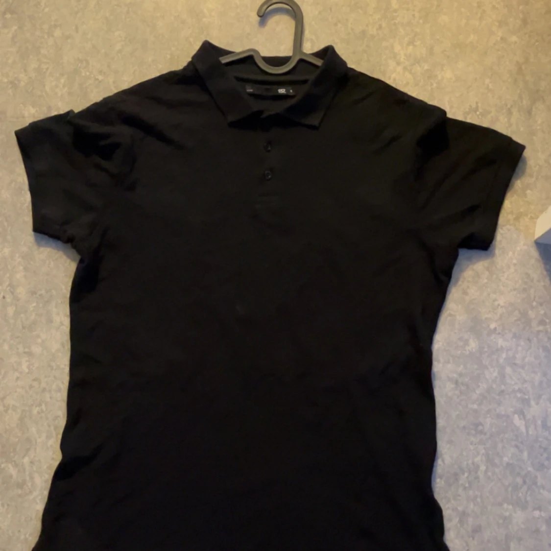 Svart piké t-shirt med krage