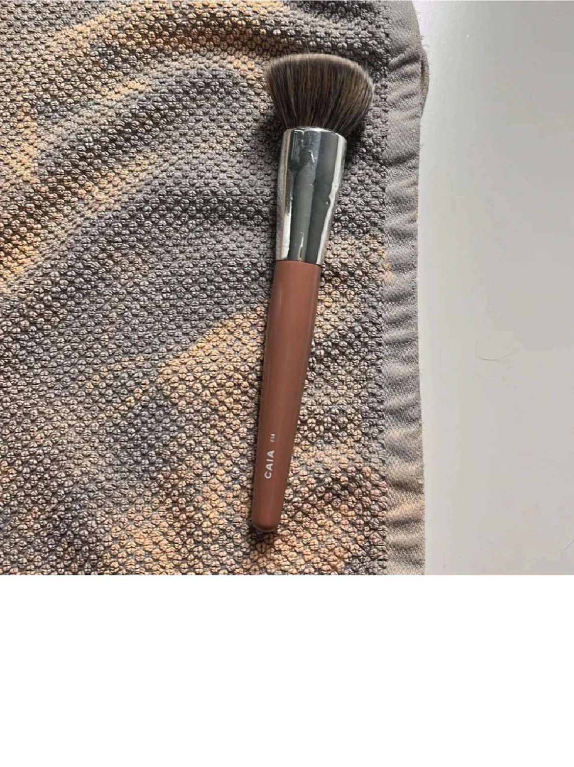 Caia sminkborste