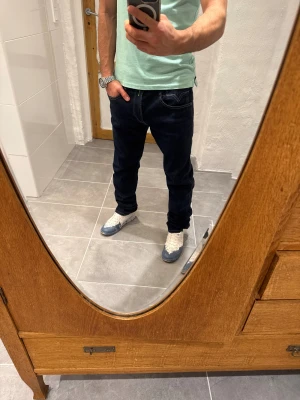 Replay jeans  - Ett par snygga byxor från Replay i storlek W34 L34 i modellen Anbbas 