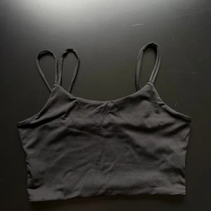 Svart linne  - Svart linne med dubbla band storlek s