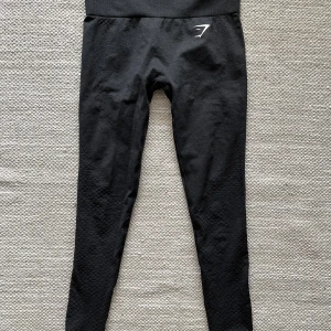 Gymshark tights - Gymshark vital 2.0 svarta tights, använd fåtal gånger och är i nyskick. 