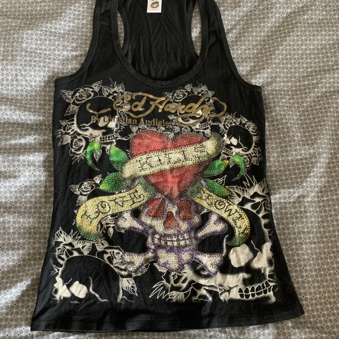 Ed Hardy linne - 90