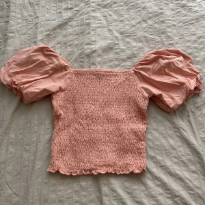 Rosa topp - Fin rosa topp, formar figuren 