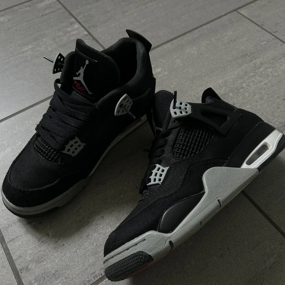 Jordan 4 Black Canvas