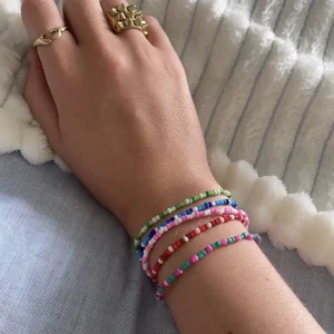 Armband  - -