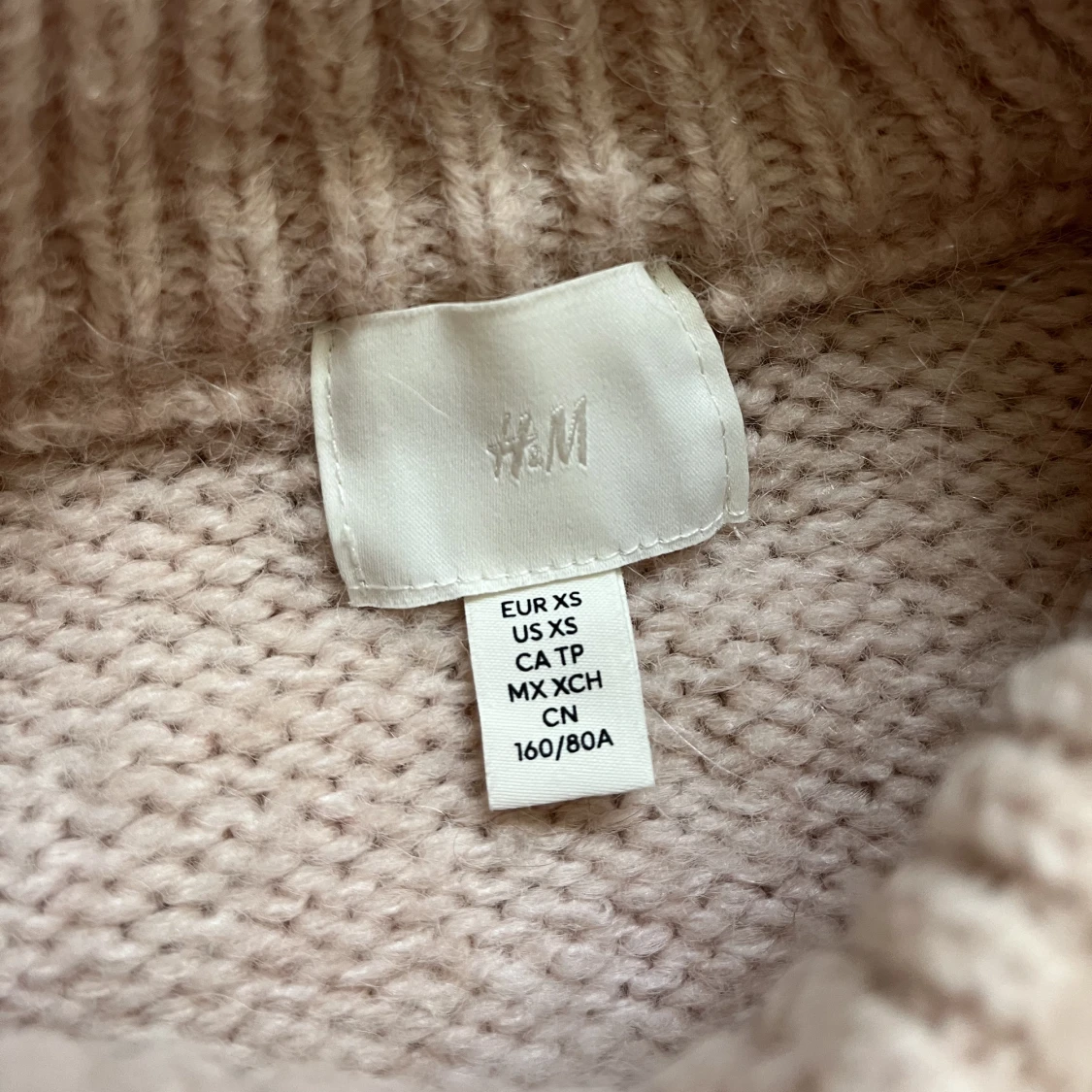 ljusrosa stickad tröja - 91