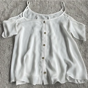 Topp - Topp i luftigt material