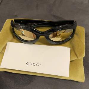 Oanvända Gucci solglasögon.